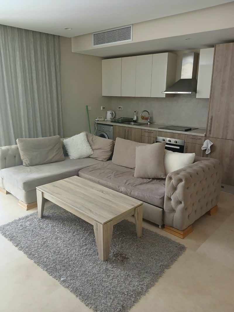Mangroovy One Bedroom Garden View — living room and kitchen